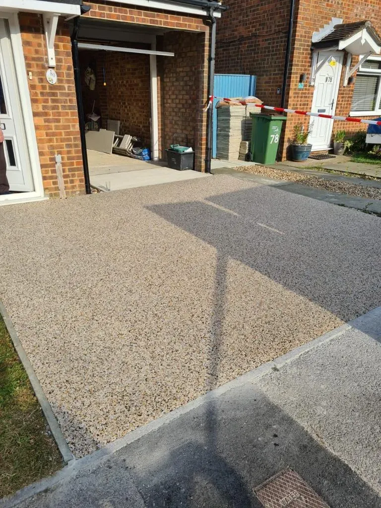Newly installed light brown resin bound driveway