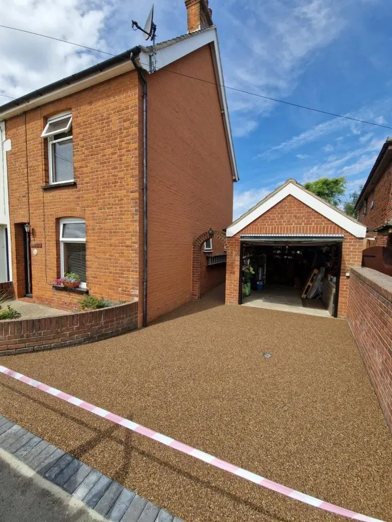 Newly installed golden brown resin bound driveway in Canterbury, Kent.