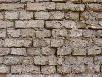 Texture of aged brickwork with rough mortar