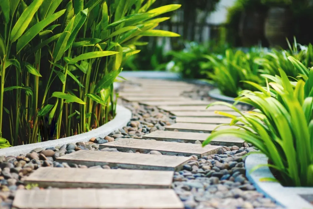 Curved garden path with stepping stones and greenery, perfect for garden landscaping
